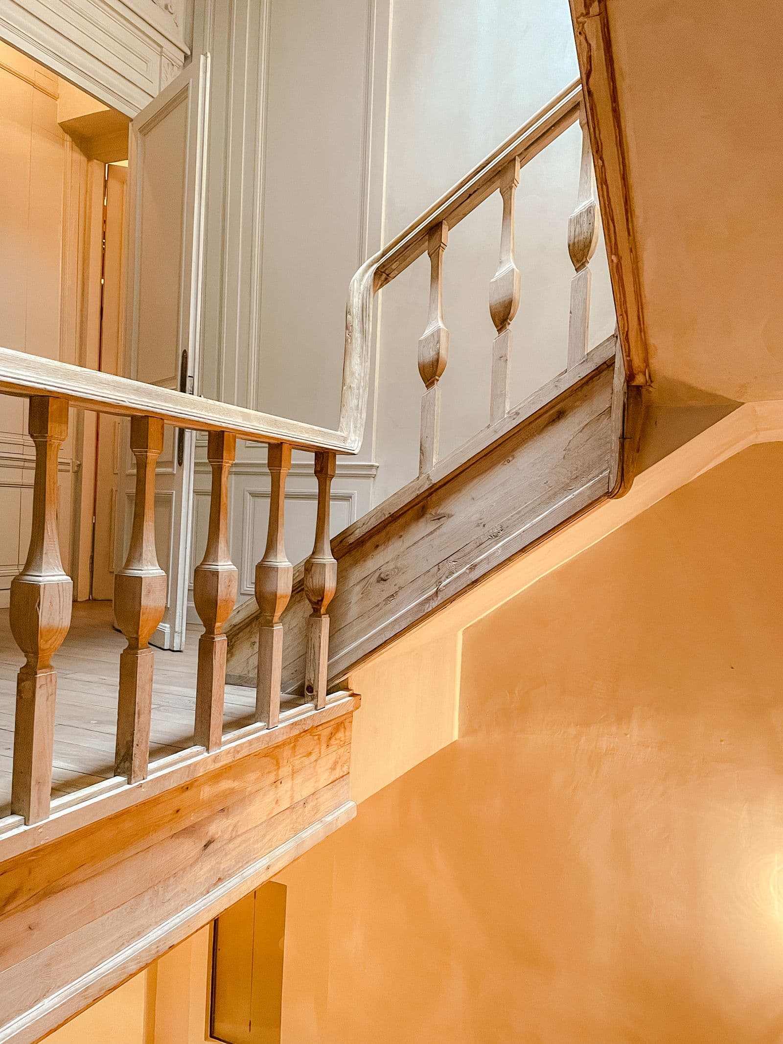 Refinished wooden balustrade with turned balusters